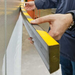 Stootrand zelfklevend cirkel 40/32/ter bescherming van oppervlakten/lengte 1 meter/polyurethaan/geel-zwart/voor binnen- en buitenbereik